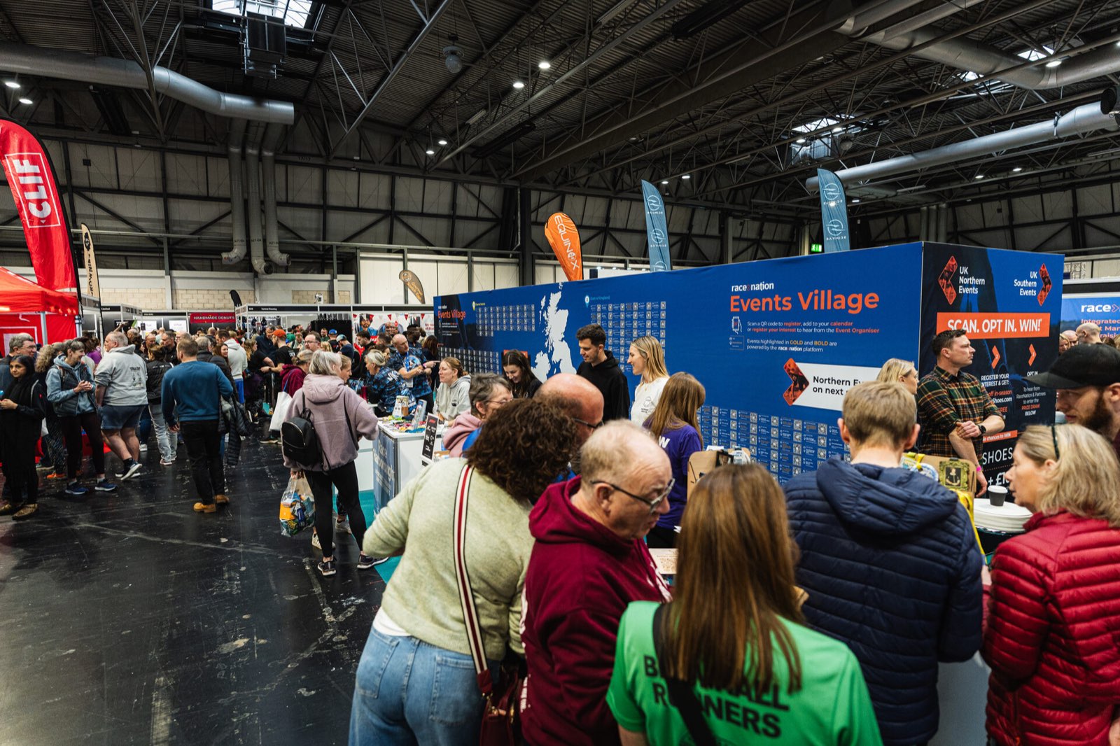 Runners exploring the Events Village at the The National Running Show